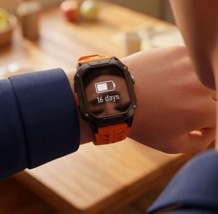 The APEX going on his wrist at the kitchen table